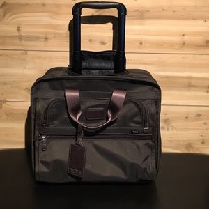 TUMI luggage laptop professional roller bag